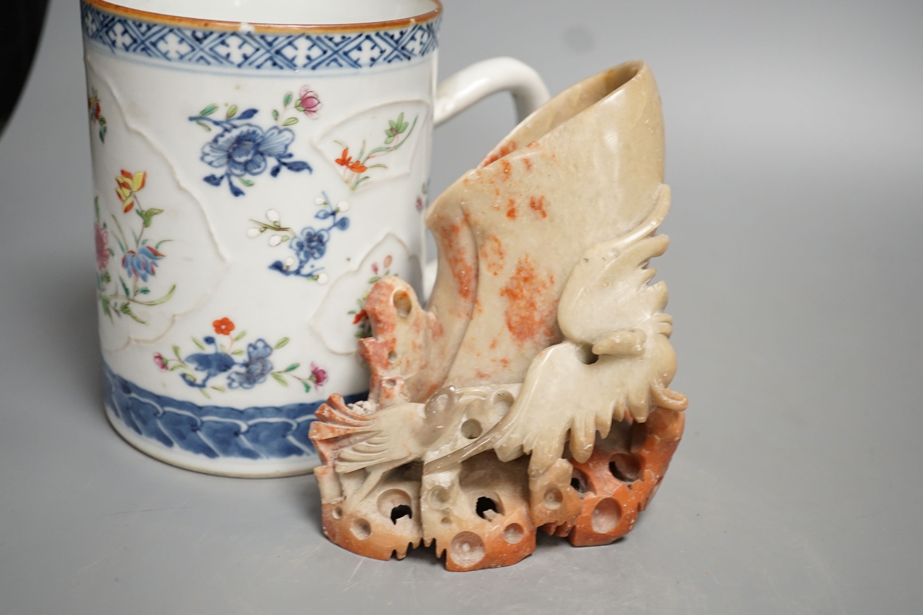 An 18th-century Chinese export mug, 15cm high, two similar plates, four 20th century Chinese dragon plates and a soapstone vase